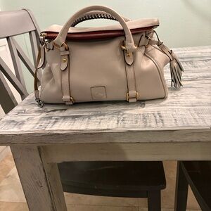 Dooney & Bourke Cream Satchel with Red Accents